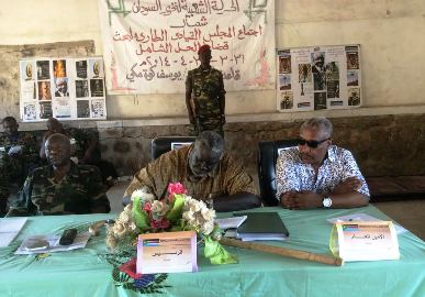 SPLM-N leader Malik Agar (C) flanked with his deputy Abdelaziz Hilu (L) and secretary-general Yasir Arman at an extraordinary meeting of the SPLM-N Leadership Council, which was held from 31 March to 3 April 2014