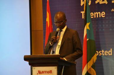 South Sudan’s presidential advisor on legal affairs, Telar Ring Deng, speaks at the South Sudan-China Investment Forum in Beijing on 12 April 2014 (Photo: People's Daily Online)