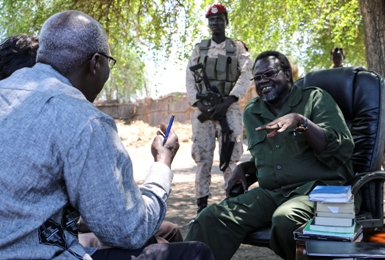 South Sudanese rebel leader talks to UN officials during a meeting at an undisclosed location on 29 April 2014 (Photo: Isaac Alebe Avoro Lu’ba/UNMISS)