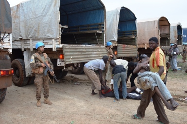 A UNMISS-supplied photo showing peacekeepers evacuating civilians in Bentiu, the capital of South Sudan's Unity state, which was the scene of recent ethnically motivated attacks