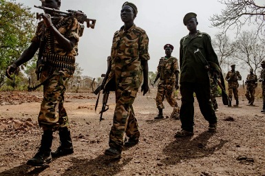 Soldiers from the South Sudanese army (SPLA) on patrol in Lakes state's Yirol East county on 15 February 2014 (Photo: Fabio Bucciarelli/Al Jazeera)