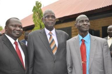 Jonglei’s new deputy governor, Baba Medan (L), and Pochalla county commissioner Omot Acheu (R), pictured with governor Lt Gen John Kong (C), were sworn in to office on 2 April 2014 (ST)