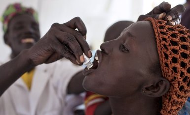 A  woman is given a cholera vaccine at a medical camp run by the humanitarian organisation Medecins Sans Frontieres in Minkamman, in South Sudan's Lakes state (Photo: Getty Images)