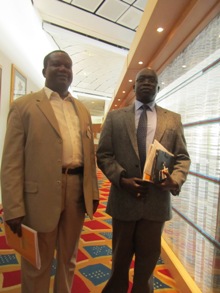 The SPLM in Opposition's head of delegate, Hussein Mar Nyuot (R), with another unidentified opposition leader in Oslo, Norway, on 19 May 2014 (ST)