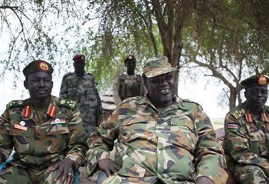 South Sudan's rebel leader and former vice-president, Riek Machar, (C) attends an interview in Upper Nile state's Nasir on 14 April 2014 (Photo: AFP/Zacharias Abubeker)