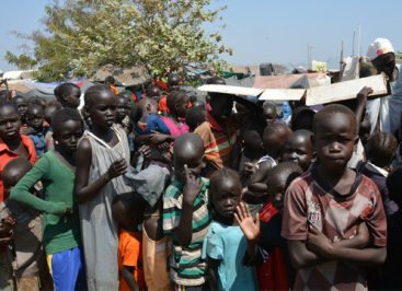 Children wait to receive a measles vaccine at the UNMISS camp in Bor, the capital of South Sudan's Jonglei state (Photo: UNICEF)