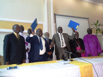 The South Sudan government delegation and their SSDM/A Cobra faction counterparts after sigining a final peace deal in Addis Ababa, Ethiopia on 9 May 2014 (ST)