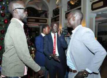 Mabior Garang de Mabior (L), the son of late South Sudanese leader John Garang and member of the rebel negotiating team arrives in Addis Ababa with other delegates on 2 January 2014 (Photo:AP/Elais Asmare)