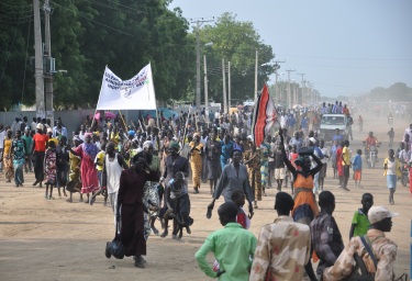 Residents of South Sudan's Jonglei state celebrate the country's third anniversary since gaining independence from the north in the capital, Bor, on 9 July 2014 (ST)