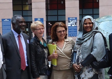 NUP deputy president Meriam al-Mahdi (R) and JEM leader Gibril Ibrahim (L) poses with two EU  MPs outside the EU parliament in Strasbourg, on 16 July 2014 (ST)