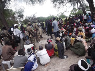 Hundreds of civilians attend a briefing by CRS staff in Padiet in Jonglei state's Duk county on 7 July 2014 (ST)