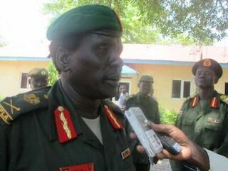 Peter Gadet, a former general in the South Sudanese army (SPLA), addresses the media in the Jonglei state capital, Bor, on 2 April 2013 (ST)