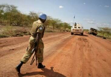 An officer from the UN peacekeeping mission in Abyei (UNISFA) on patrol in the disputed region, which is claimed by both Sudan and South Sudan (AFP)