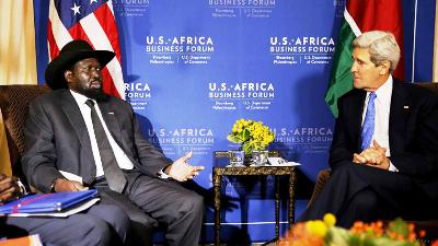 President Salva Kiir with US secretary of state John Kerry as they hold a bilateral meeting at the US-Africa Business Forum in Washington on 5 August 2014 (Photo: Reuters/Jim Bourg)
