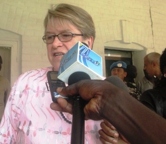 The head of the UN Mission in South Sudan (UNMISS), Ellen Margrethe Loej, speaks to the media during a visit to Western Bahr el Ghazal state on 23 September 2014 (ST)