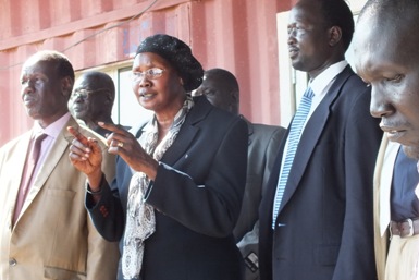 From left deputy vice-chancellor for administration Professor Robert M.K. Deng, vice-chancellor Julia Aker Duany and the dean of students affairs, David Malual Wuor speak to students after Jonglei state’s Dr John Garang Memorial University of Science and Technology is officially reopened on 22 September 2014 (ST)
