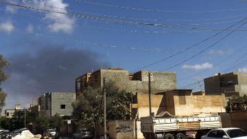 Smoke rises following an air strike in Libya's eastern coastal city of Benghazi on September 1, 2014 (AFP Photo/Abdullah Doma)