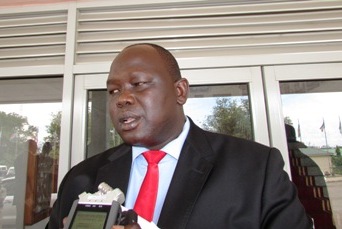 Samuel Duwar Deng, who chairs South Sudan's parliamentary committee for defence, security and public order, speaks to reporters at the national legislative assembly in the capital, Juba, on 2 October 2014 (ST)