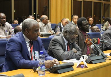 JEM leader Gibril Ibrahim (C) speaks at the opening session of Darfur negotiations flanked by SPLM-N secretary-general Yasir Arman (L) and SLM-MM leader Minni Minnawi in Addis Ababa on 23 November 2014 (Photo courtesy of AUHIP)