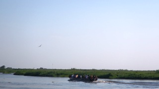 A boat crosses from Bor to Mingkaman on 10 November 2014 (ST)