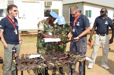 UNMISS officials prepares to destroy the seized weapons on Tuesday Dec. 09, 2014 in Juba. (ST)