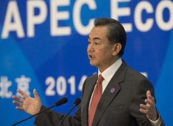 Chinese Foreign Minister Wang Yi gestures during a news conference in Beijing, November 8, 2014. (Reuters)