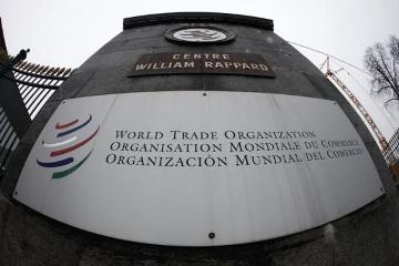 The World Trade Organization WTO logo is seen at the entrance of the WTO headquarters in Geneva on 9 April 2013 (Photo: Reuters/Ruben Sprich)