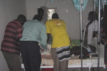 Ayum Buona, who survived a road accident in Jonglei state capital Bor, is treated for his injuries on 19 March 2015 (ST)