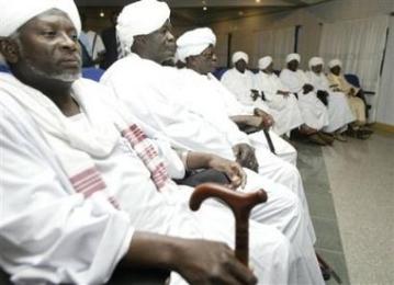 Sudanese tribal leaders attend the Darfur talks at the venue of the Darfur peace talks in Abuja, Nigeria on 2 May 2006 (AP)