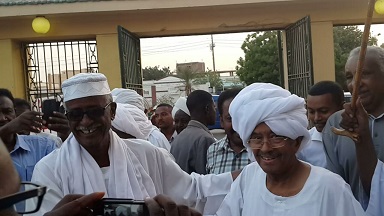 NCF leader Farouk Abu Issa (R) arrives at the premises of the National Umma Party on 12 April 2015 (ST)