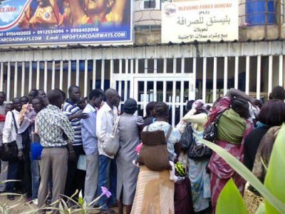 Women carrying babies are commonly seen queuing at commercial banks and forex exchange companies in Juba. Trade in dollars has now become a lucrative business in South Sudan (ST/File)