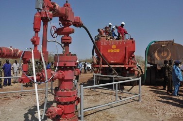 Workers at the Petrodar oil concession flush out the remaining oil prior to a shutdown on oil production by South Sudan, on January 29, 2012. (Getty)