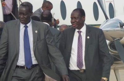 Former cabinet affairs minister and  G-10 team leader Deng Alor with former justice minister, John Luk Jok, after their arrival at  Juba Airport on 1 June 2015 (Photo Moses Lomayat)