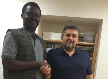 SPLM-MM leader Minni Minnawi shakes hands with the head of 11 January group Mohamed Sifaoui in Paris after the signing of the Call against Islamism on 15 July 2015 (Photo from Sifaoui page on Twitter)