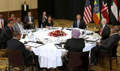 U.S. President Barack Obama holds a meeting on South Sudan with IGAD leaders at his hotel in Addis Ababa, Ethiopia July 27, 2015.  Pictured at the table are: Obama (clockwise from the top center), U.S. Special Envoy to Sudan and South Sudan Donald Booth, Uganda's President Yoweri Museveni, African Union Chairperson Dlamini Zuma, Ethiopia's Prime Minister Hailemariam Desalegn, Sudan's Minister of Foreign Affairs Ibrahim Ghandour, Kenya's President Uhuru Kenyatta and U.S. National Security Advisor Susan Rice. (Photo Reuters/Jonathan Ernst)