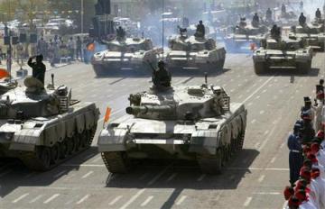 FILE - Sudanese military forces parade in their tanks during Independence Day celebrations in Khartoum (REUTERS/MOHAMED NURELDIN)