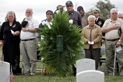 Parents and friends at the funeral in 2000 for a sailor killed during the bombing of the USS Cole. (AFP File Photo)
