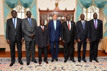 U.S. Secretary of State John Kerry poses for a photo with South Sudanese Vice President James Wani Igga, Dr. Riek Machar Teny, and Pagan Amum Okiech, Representing Signatories to the Agreement on the Resolution of the Conflict in South Sudan, at the U.S. Department of State in Washington, D.C., on October 7, 2015. [State Department photo]