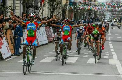 Eritrean cyclists express joy as they are finishing first and second places at Tour of Setif in Algeria, in August 2015 (Photo Madote)