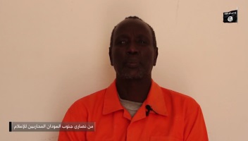 Screenshot from ISIS video showing an unidentified South Sudan man's beheading (ST)