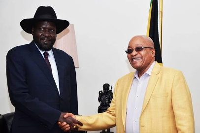 South Africa's President Jacob Zuma (R) shakes hands with the visiting South Sudanese President Salva Kiir at his office in Pretoria on 24 October 2015 (Photo Moses Lomayat)