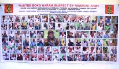 A poster featuring wanted Boko Haram members, pasted onto the wall by Nigeria army in Maiduguri, Nigeria, on 30 October 2015 (Photo AP/Jossy ola).