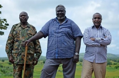 SPLM-N leader Malik Agar (C) his deputy Abdel Aziz al-Hilu (L) and SG Yasir Arman pose for a picture in undisclosed location in the  rebel controlled areas in March 2014 (AFP/Getty Photo)