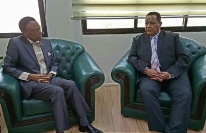 Sudan's FM Ibrahim Ghandour (R) receives UNAMID head Martin Ihoeghian Uhomoibhi in his office in Khartoum on January 07, 2016 (Photo released by the Sudanese foreign ministry)