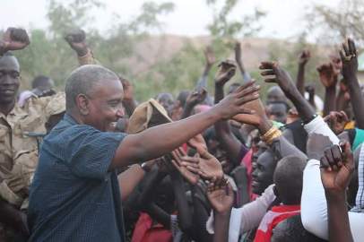 Secretary-General Yasir Arman waives hands to supporters during his visit to the SPLM-N controlled areas in the Nuba Montains. Picture released by the SPLM-N on 30 March 2016