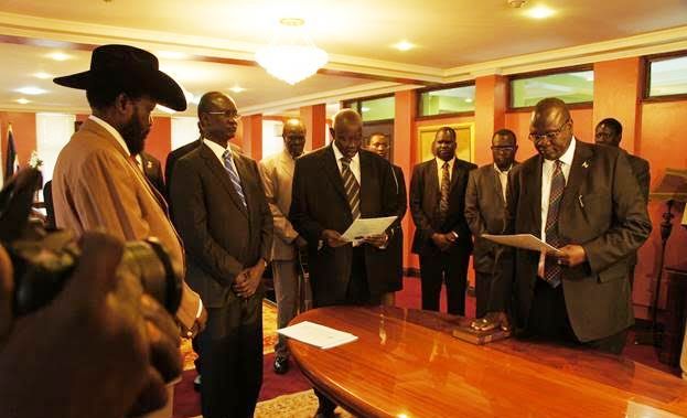 South Sudan's Vice President, Riek Machar Teny, takes oath of office before President Salva Kiir, two days after South Sudan independence,  in Juba, on 11 July 2011 (Photo Lomayat Moses)