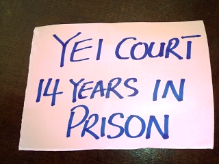 Posters held by women groups during the court ruling in Yei on 21, April 2016 (ST)