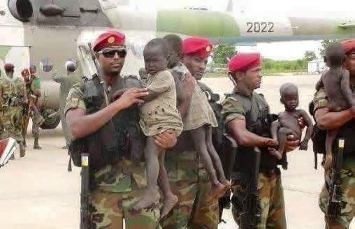 Ethiopian troops carrying some of the recovered children abducted by Murle armed men, 11 May 2016 (Facebook photo)