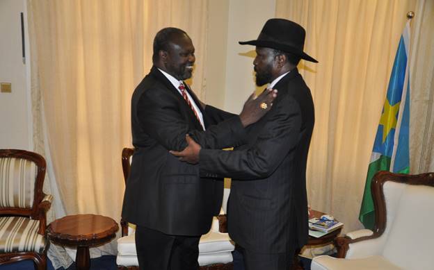 President Salva Kiir greets First Vice President Riek Machar before to start a meeting at the South Sudanese presidency in Juba on 3 June 2016 (Photo Moses Lomayat)