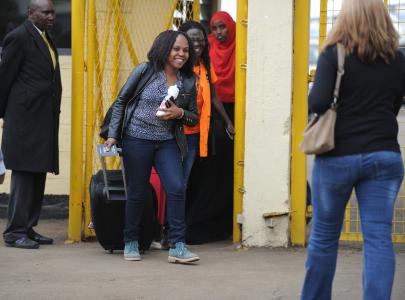 Aid workers from different Non-Governmental Organizations in South Sudan arrive at Wilson airport in Nairobi, Kenya Wednesday, July 13, 2016 from Juba. (AP Photo)